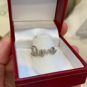 Solid gold + diamond “Love” script ring